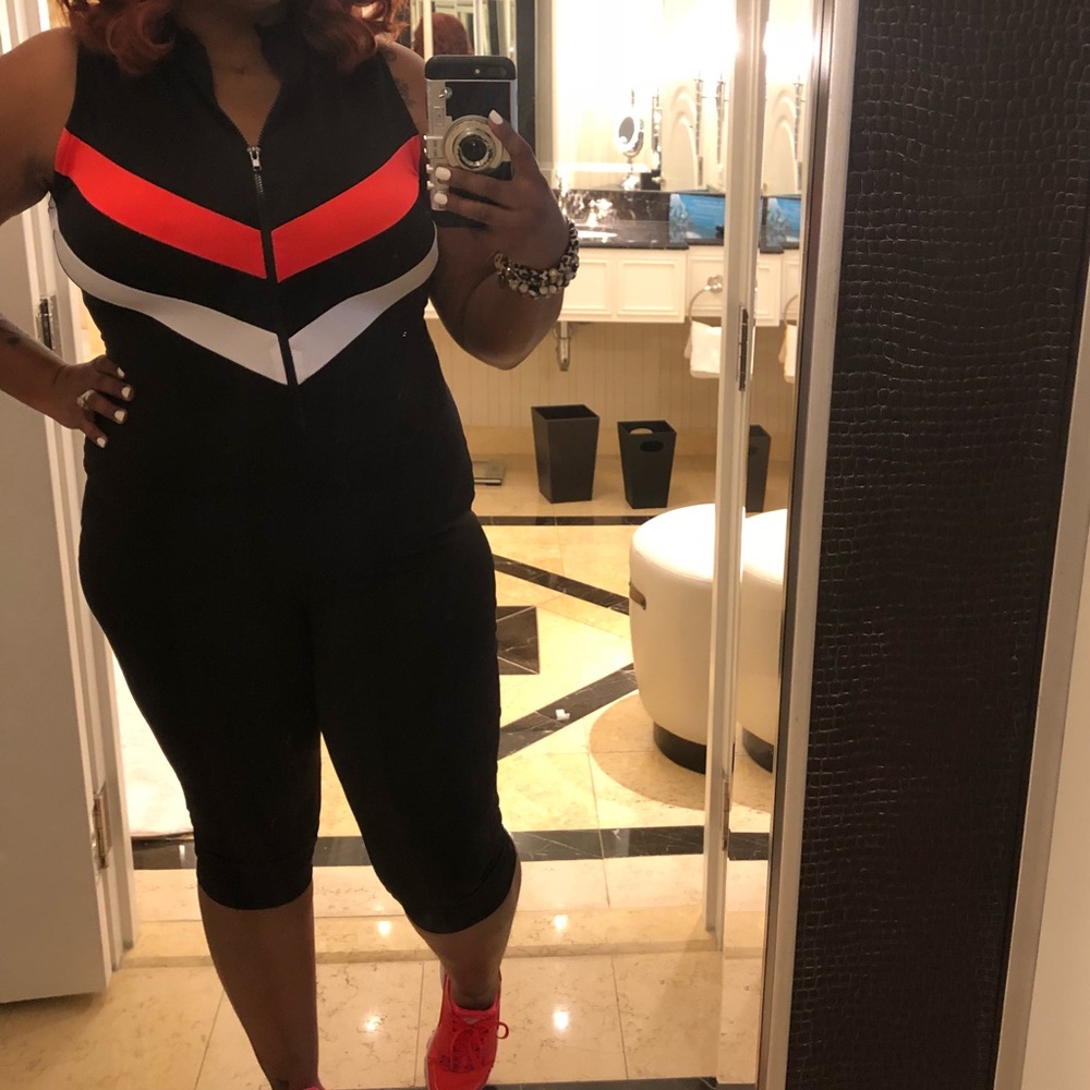 One piece suit. Fashionable onesie. With zipper.